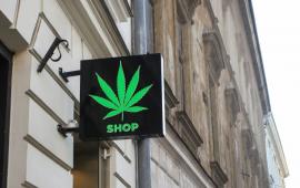 Picture of building with marijuana leaf sign that says SHOP