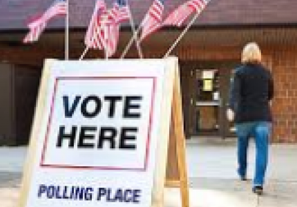 Vote here polling place sign