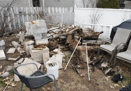 Image showing trash build up in residential yard.