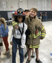 Participants dressed in firefighter gear