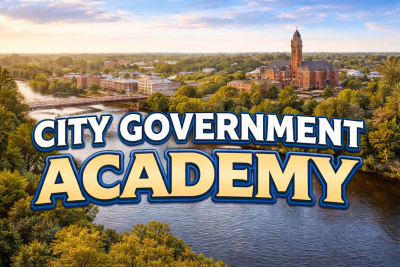 Picture of big city with river and bridge and the words City Government Academy