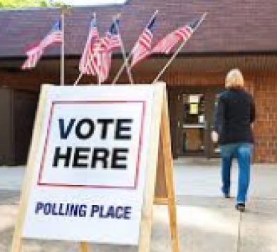 Vote here polling place sign