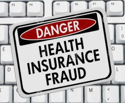 Keyboard with Danger sign for health insurance fraud
