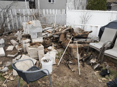 Image showing trash build up in residential yard.